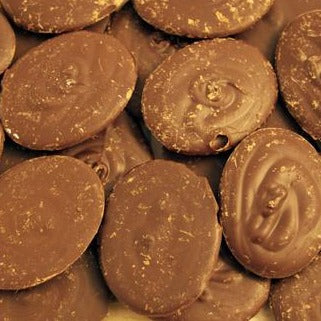 a pile of Kokoa Collections Venezuela 58% Smooth hot chocolate award winning pebbles