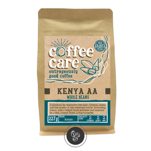 A 227g kraft packet of Coffee Care’s Kenya AA Coffee. Blue label for whole beans. Kenyan coffee. 100% Arabica whole beans