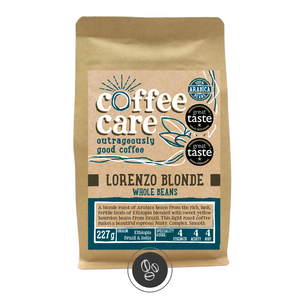 A 227g kraft packet of Coffee Care’s Lorenzo Blonde Coffee. Blue label for whole beans. Brazil, Ethiopia and India coffee. 100% Arabica whole beans. Great Taste Winner 2021, 2023 and 2024