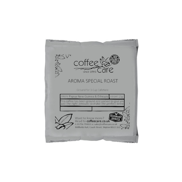 A single packet of 15g cafetiere coffee in grey recyclable packaging. Coffee Care's Aroma Special Roast 100% Arabica coffee from Papua New Guinea and Ethiopia