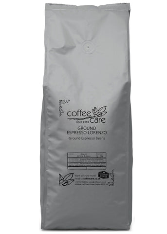 A 1 kilo grey recyclable packet of Coffee Care's Espresso Lorenzo Ground Espresso Beans. Coffee from Brazil, Africa and Asia pre ground for espresso.