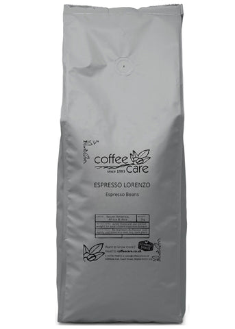 one kilo grey recyclable packet of Coffee Care's Espresso Lorenzo Espresso Beans. Coffee beans from South America, Africa and Asia