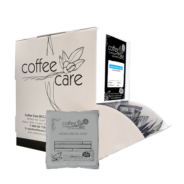 Coffee Care dispenser box of 100 grey recyclable packets of 15g Aroma Special Roast cafetiere coffee. A white dispenser box with 1 cafetiere sachet lent up next to it.