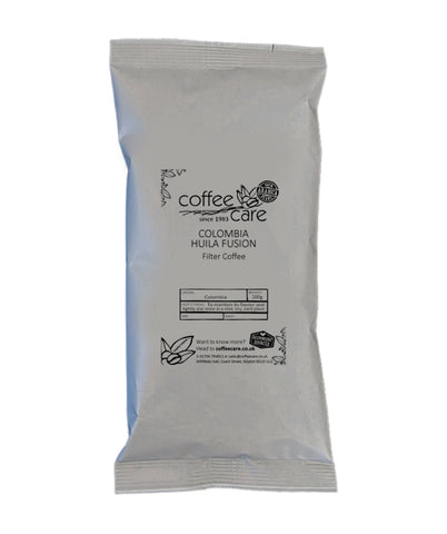 one 200g grey recyclable packet of Coffee Care's Colombia Huila Fusion Bulk Brew Filter Coffee. 100% Arabica Coffee from Colombia, Great Taste Winner 2022 