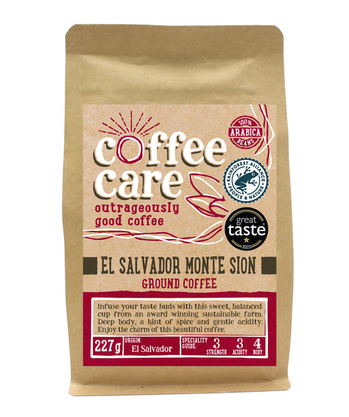 A 227g kraft packet of Coffee Care’s El Salvador Monte Sion Estate ground coffee. Pink label ground for filter & cafetiere. Freshly ground El Salvador Coffee. 100% Arabica beans, Rainforest Certified. Great Taste Award winner 2014 and 2022