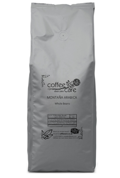 A 1 kilo grey recyclable packet of Coffee Care’s Montana Arabica Coffee. Colombia, Brazil, Latin America whole coffee beans. 100% Arabica whole beans