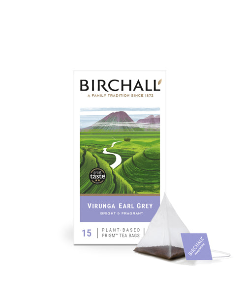 Front view of cardboard box of 15 Birchall Virunga Earl Grey prism tea bags. Green hill graphics with lilac band, East Africa’s finest single estate tea, for anytime. Great Taste winner 2016 with one prism teabag displayed next to box