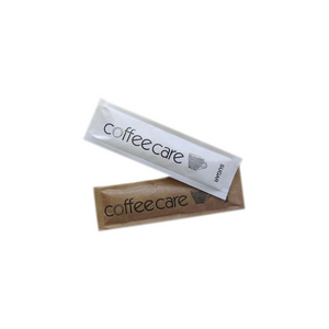 one brown and one white Coffee Care flat sugar stick on white background