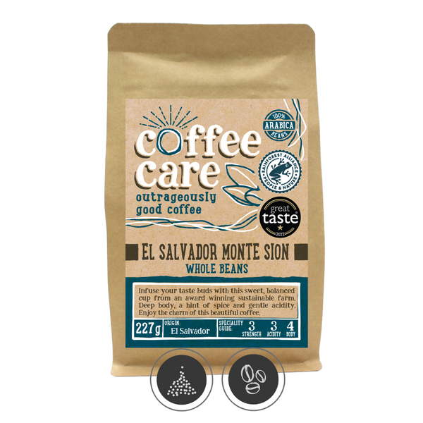 A 227g kraft packet of Coffee Care’s El Salvador Monte Sion Estate Coffee Beans. Blue label for whole beans. Freshly roasted El Salvador Coffee. 100% Arabica beans, Rainforest Certified. Great Taste Award winner 2014