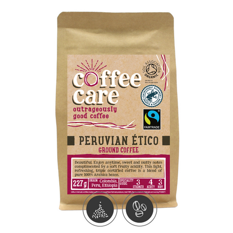 A 227g kraft packet of Coffee Care’s Peruvian Etico ground coffee. Pink label ground for filter & cafetiere. Freshly roasted & ground Peru, Colombia & Ethiopia Coffee. Organic, Rainforest and Fairtrade Certified