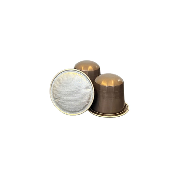 image of 3 loose silver nespresso compatible coffee capsules