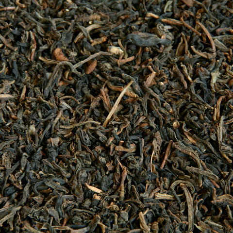 A close up image of Decaffeinated loose leaf tea leaves.