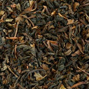 A close up image of Formosa Oolong loose leaf tea leaves.