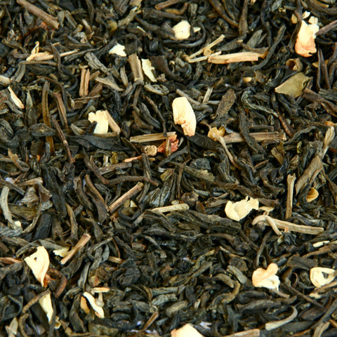 A close up image of Jasmine with Flowers loose leaf tea leaves.