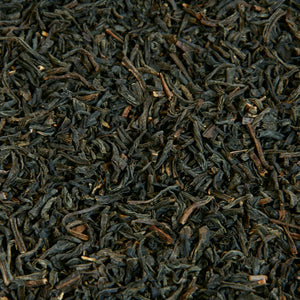 A close up image of Keemun loose leaf tea leaves.