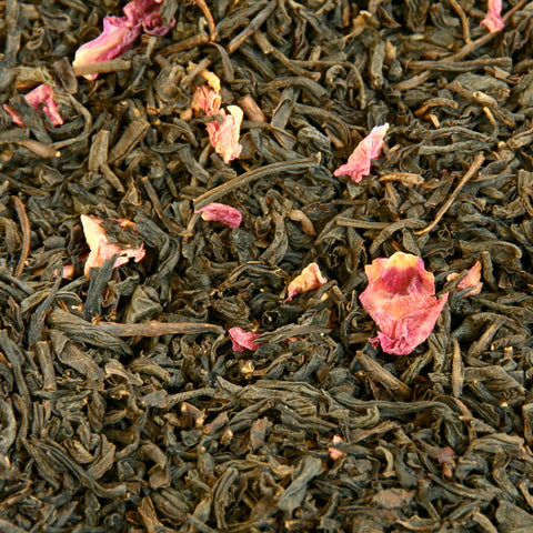 A close up image of Rose Congou loose leaf tea leaves.